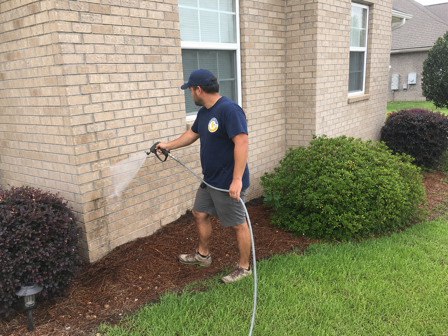 Before and after gutter brightening on a home in Mobile, AL showing oxidation removal