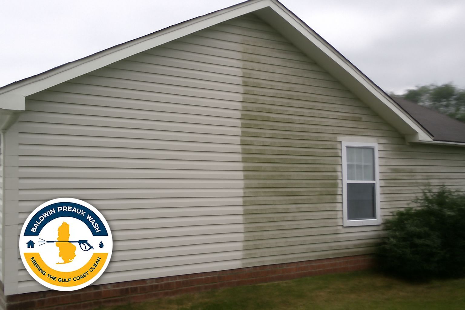 Close-up of mildew streaks on vinyl siding in a Foley Alabama subdivision