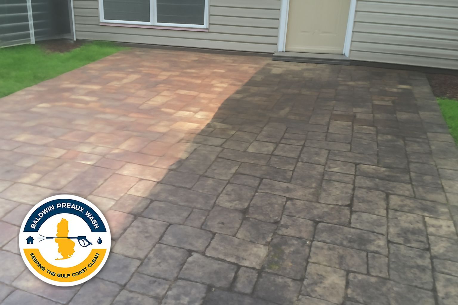 Baldwin Preaux Wash technician applying paver sealer to a Gulf Shores outdoor living area